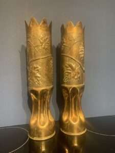WW1 trench art pair would make a great vase display.