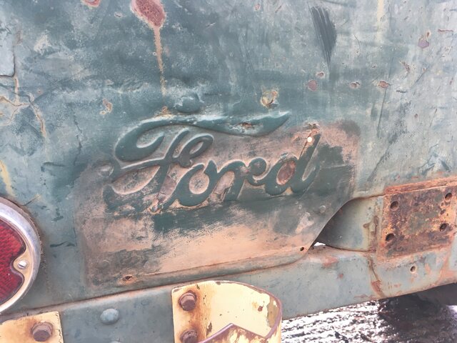 Ford Jeep emblem.